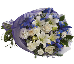 Bouquet of flowers from roses, lilies, irises and carnations