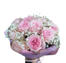 Bouquet of pink roses with gypsophila